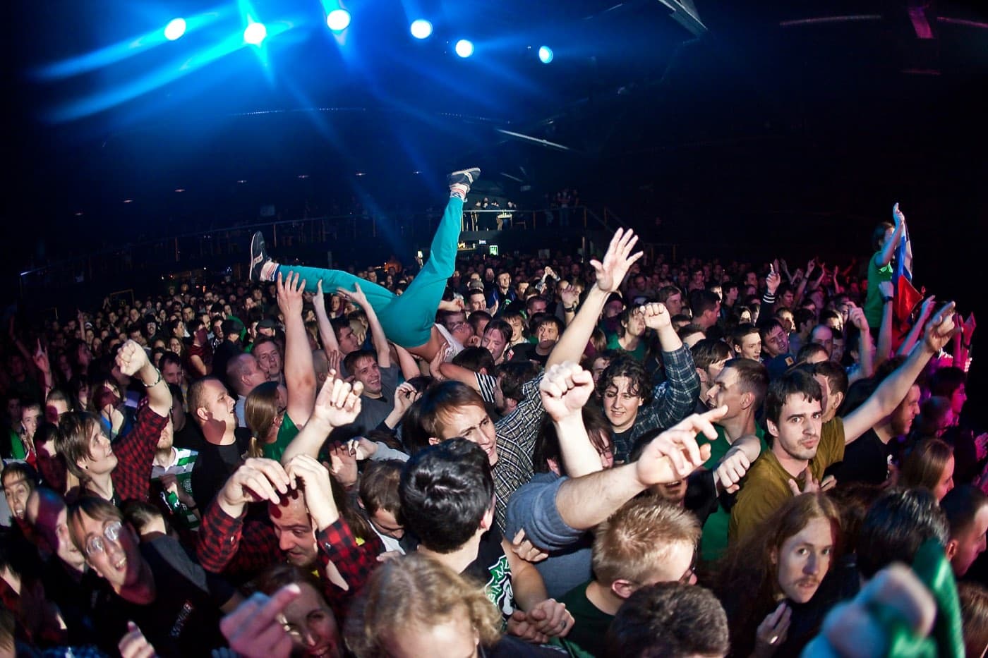 A packed crowd of attendees at a concert, illustrating the scale of an event's audience