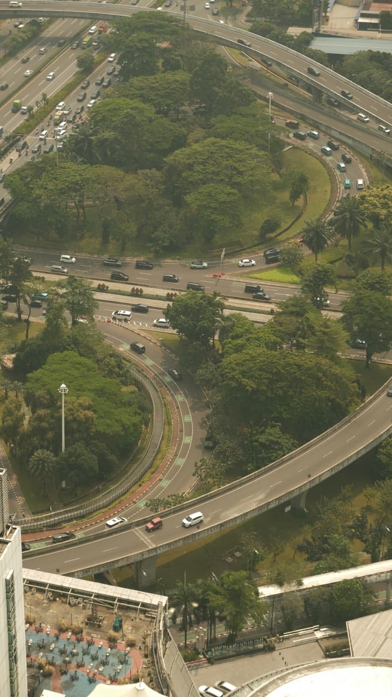 Aerial view of a multi-lane access highway with roundabouts