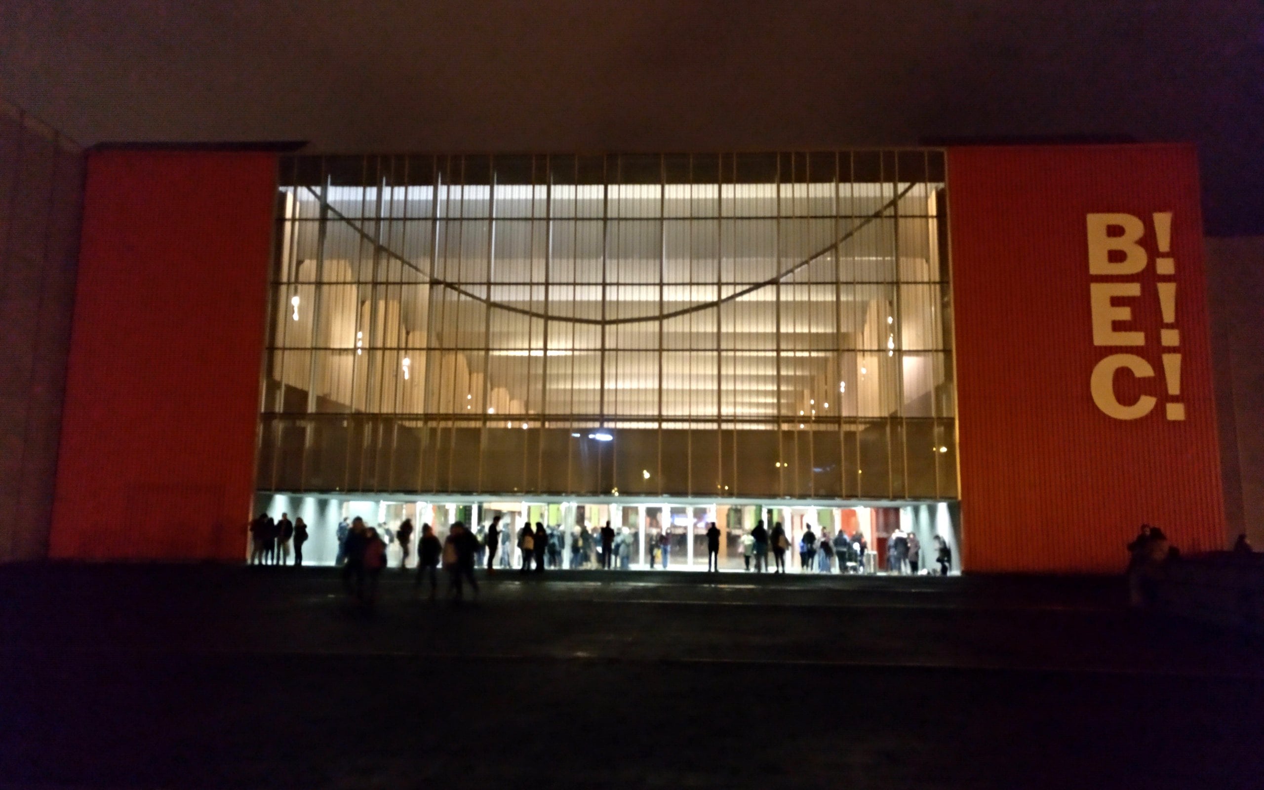 Entrance to the Bilbao Exhibition Centre (BEC) at night with people arriving (archive image from another event)